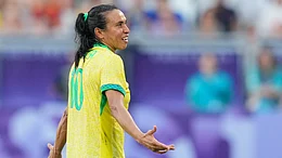 Brazil's Marta leaves the pitch after being shown a red card during a women's Group C football match between Brazil and Spain. - AP