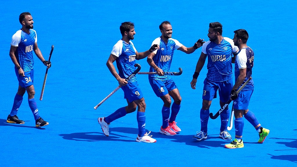 AP/Aijaz Rahi : The Indian men's hockey team celebrate a goal.