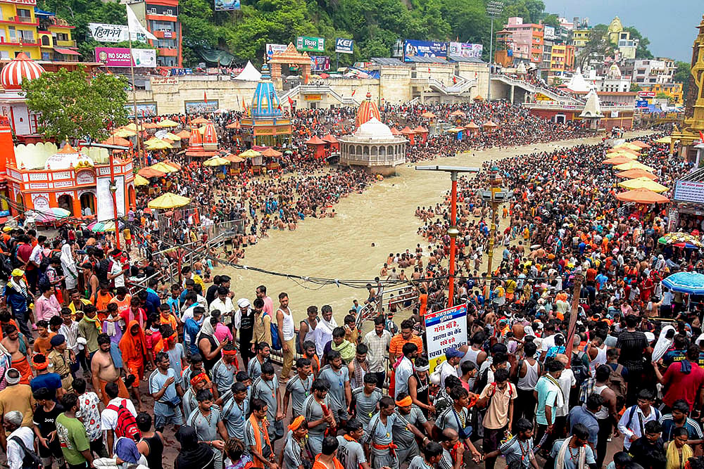 Kanwariyas gather to fetch water in Haridwar