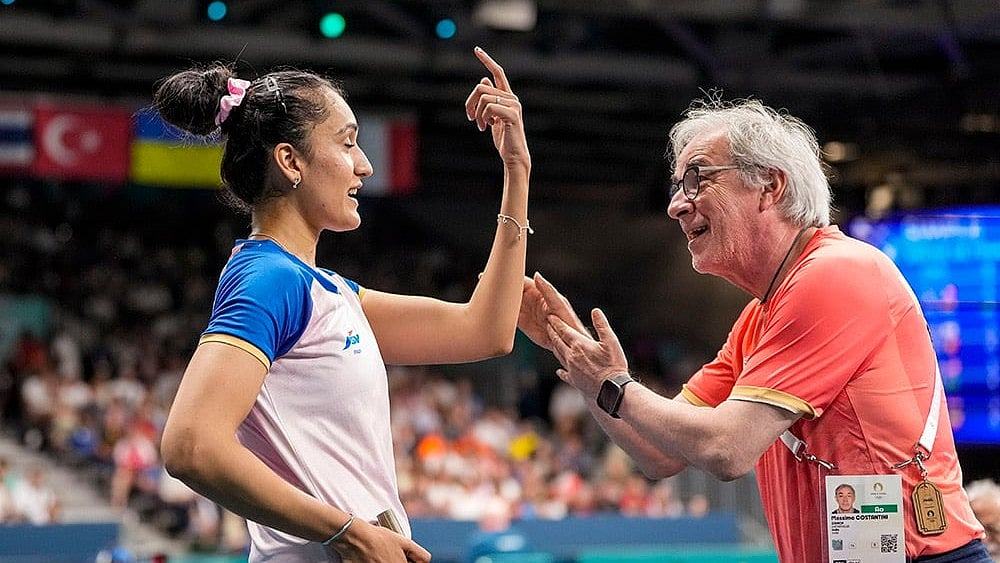 | Photo: PTI/Ravi Choudhary : Manika Batra with her German coach Chris Pfeiffer at the Paris Olympics.