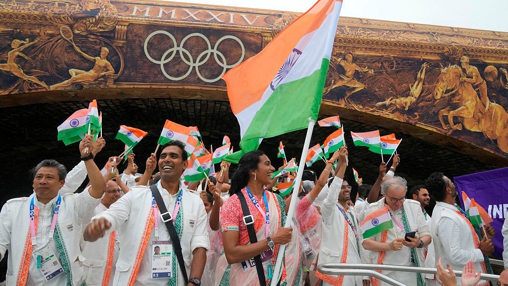 Indian flagbearers Achanta Sharath Kamal and PV Sindhu at the 2024 Paris Olympic Games Opening Ceremony - X/@Olympics