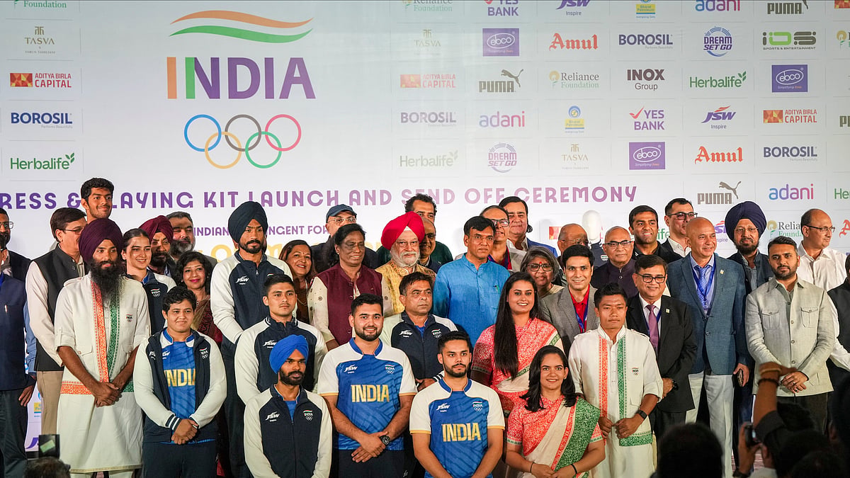 New Delhi: Union Minister of Youth Affairs and Sports Mansukh Mandaviya, Union Minister of Petroleum and Natural Gas Hardeep Singh Puri and IOA Chief PT Usha with athletes during the launch of the ceremonial dress and playing kit for the upcoming Paris Olympics, in New Delhi, Sunday, June 30, 2024. - PTI/Arun Sharma
