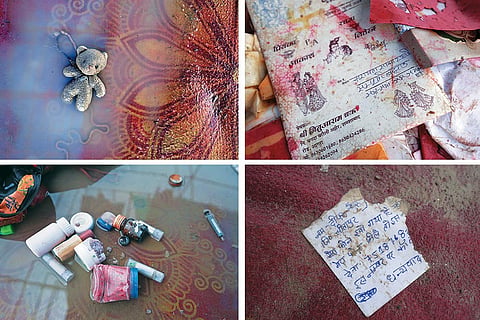 Left Behind: A muddy teddy bear, wedding invitations given to Baba, cosmetics kit, and a note left behind by a devotee who lost his phone