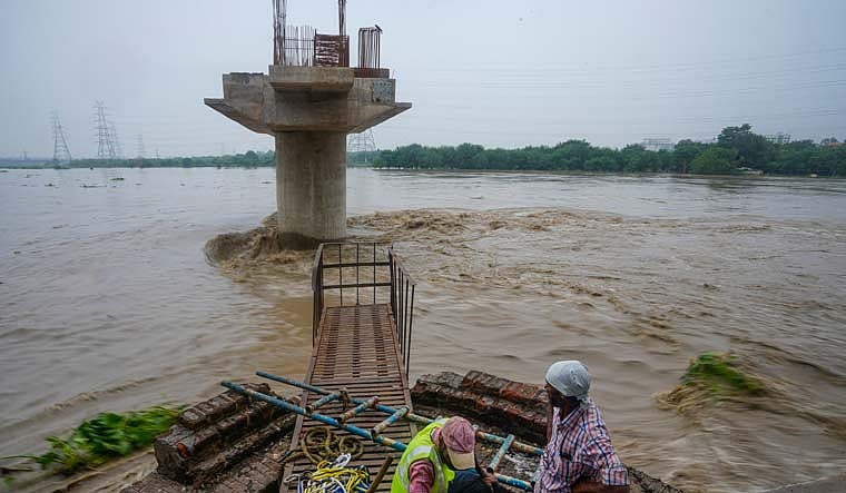 PTI : Swollen Yamuna river in Delhi