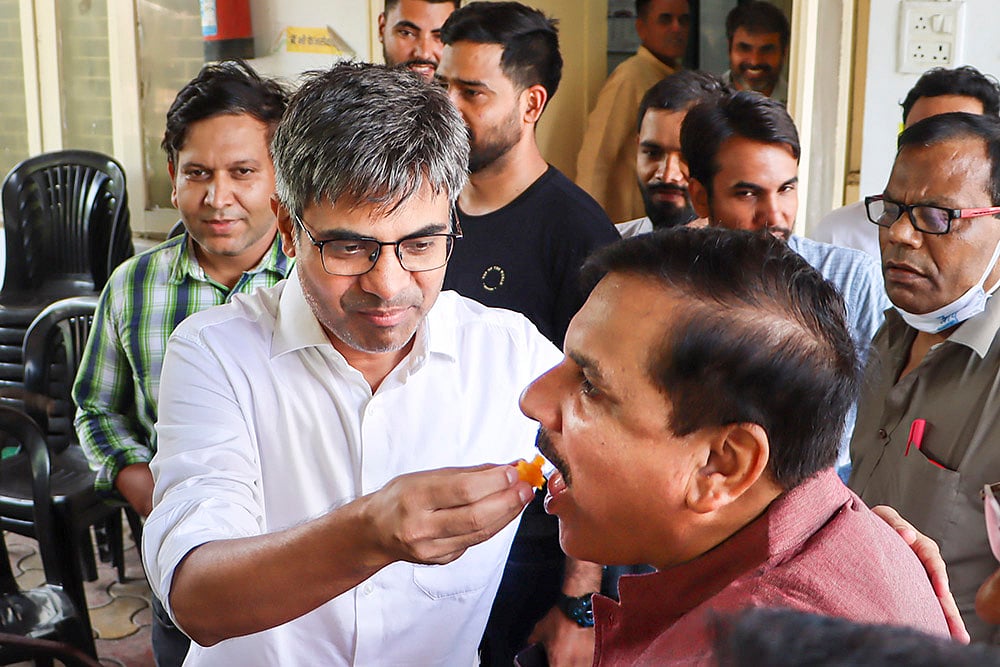 Sanjay Singh and Sandeep Pathak celebrate partys victory in Punjabs Jalandhar West Assembly by-poll