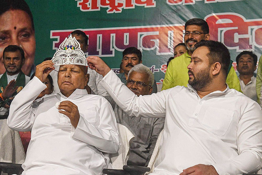 Lalu Prasad Yadav with Tejashwi Yadav during RJD Foundation Day