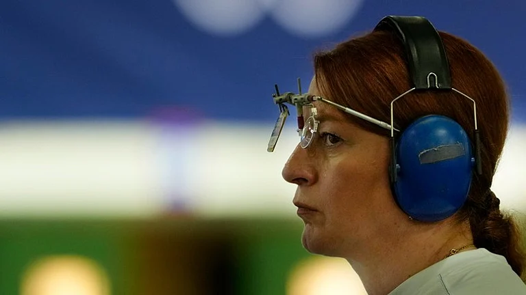 Georgia's Nino Salukvadze competes during the 10m air pistol women's qualification round at the 2024 Summer Olympics, Saturday, July 27, 2024, in Chateauroux, France. - AP/Manish Swarup