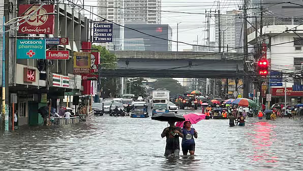 Flooded streets of Taiwan after landfall of Typhoon Gaemi - AP