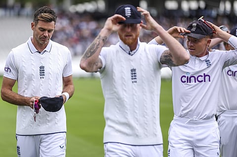 James Anderson walks off the field along with his England teammates after the end of Day 1's play, in his final Test against West Indies at Lord's.
