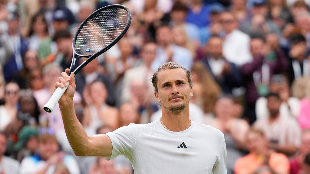 AP/Kirsty Wigglesworth : Alexander Zverev reacts after winning his third round match at Wimbledon 2024.