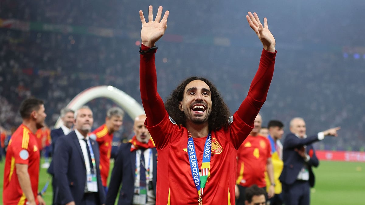 Cucurella celebrates Spain's victory.