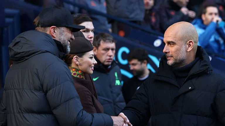 Old rivals Jurgen Klopp and Pep Guardiola have been linked with the England job - null
