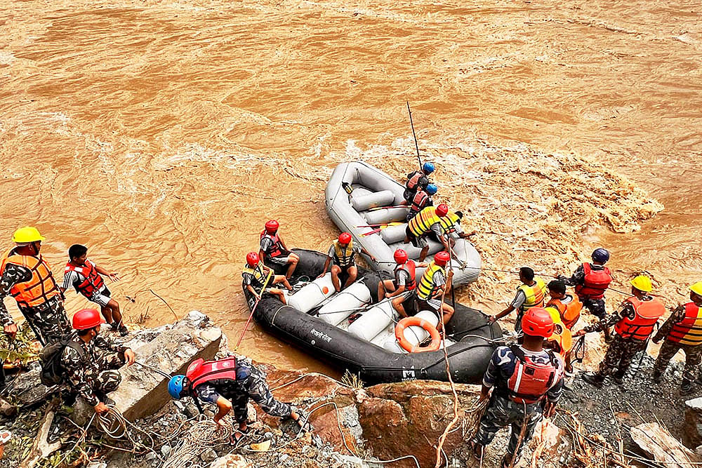 Rescue operation underway after buses swept away due to landslide in Nepal photo gallery_2