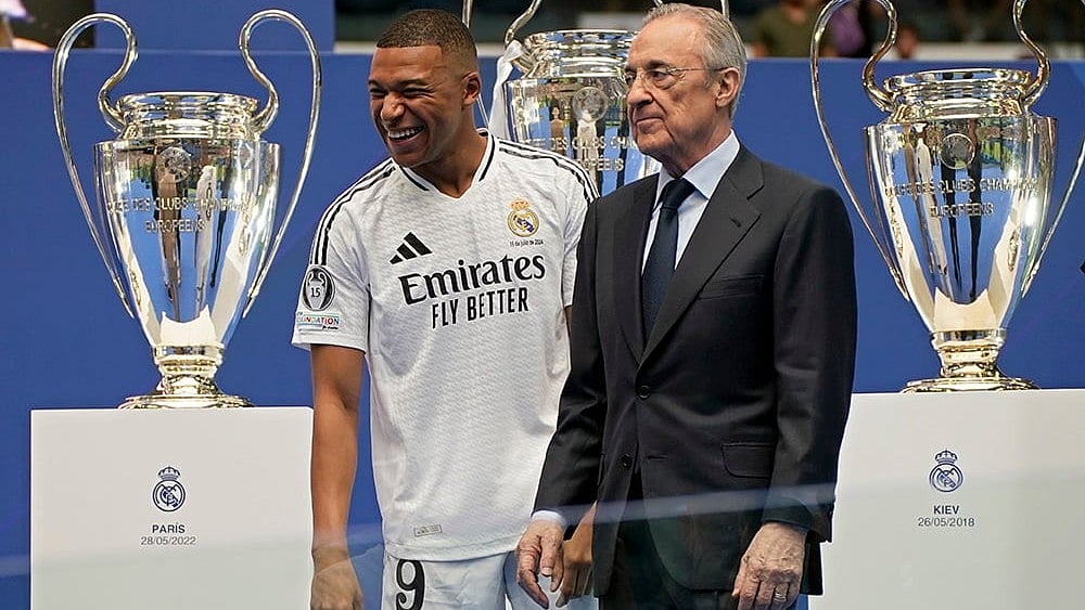 | Photo: AP/Andrea Comas : Kylian Mbappe with Florentino Perez 