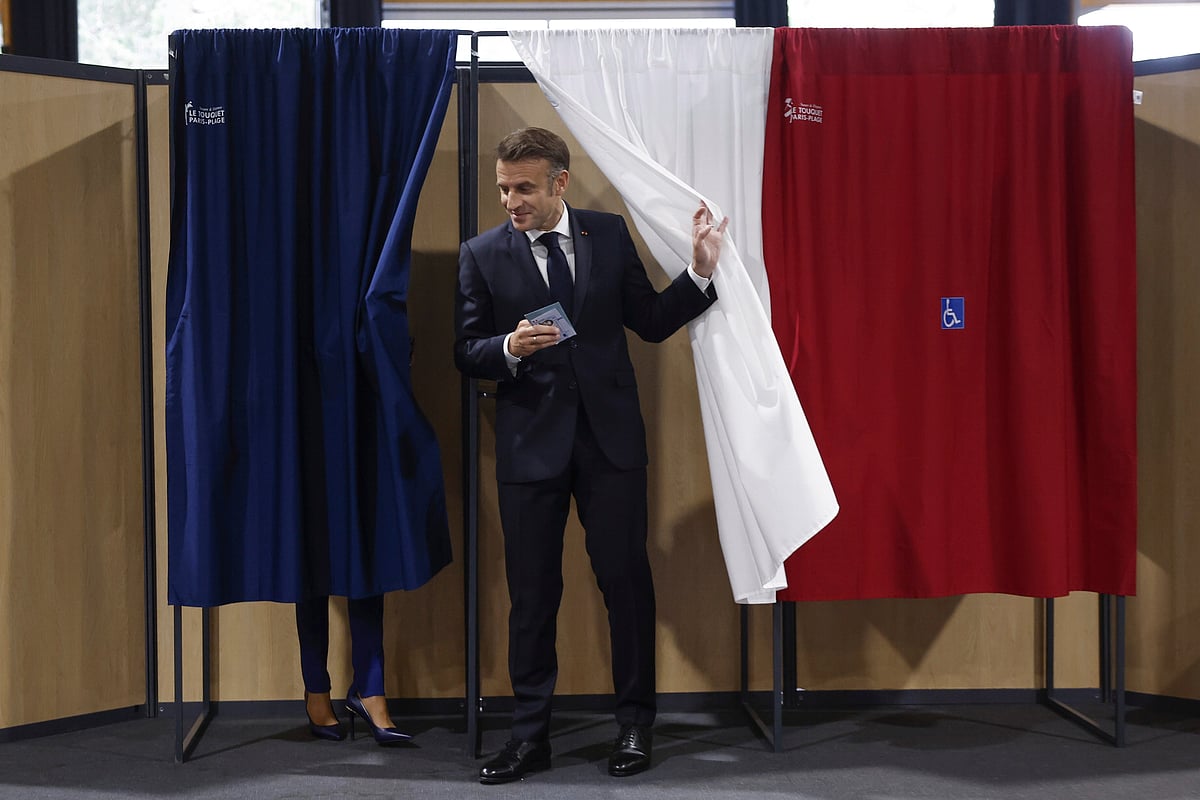 Mohammed Badra/AP :  
French President Macron