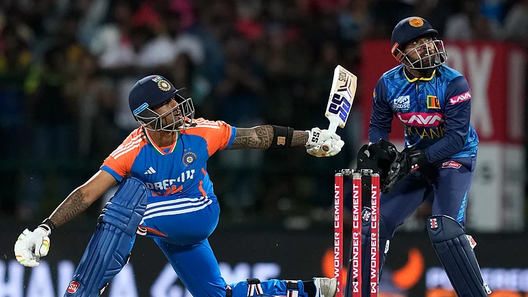 India's captain Suryakumar Yadav watches his shot during the second Twenty20 cricket match between Sri Lanka and India in Pallekele, Sri Lanka. - AP Photo/Eranga Jayawardena