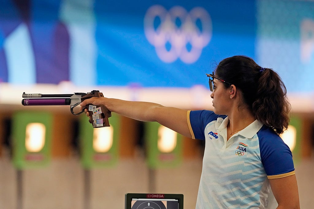 India's Manu Bhaker competes in the 10m air pistol women's qualification round at the 2024 Summer Olympics, Saturday, July 27, 2024, in Chateauroux, France. - AP