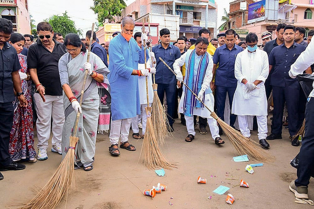 Odisha CM Mohan Charan Majhi during a cleanness drive ahead of Rath Yatra festival 