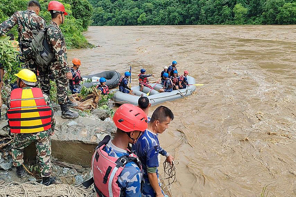 Rescue operation underway after buses swept away due to landslide in Nepal photo gallery_3