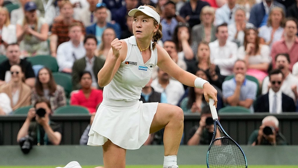 Lulu Sun reacts after winning a point against Emma Raducanu of Britain during their fourth round match at the Wimbledon in London. - AP/Alberto Pezzali