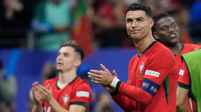 Portugal's Cristiano Ronaldo applauds after a round of sixteen match between Portugal and Slovenia at the Euro 2024 soccer tournament in Frankfurt, Germany, Monday, July 1, 2024. - (AP Photo/Matthias Schrader)