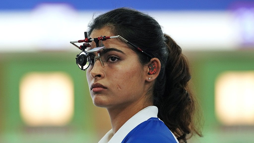 Manu Bhaker in action during the 10m air pistol women's qualification round at Paris Olympic Games 2024 on Saturday (July 27). - AP