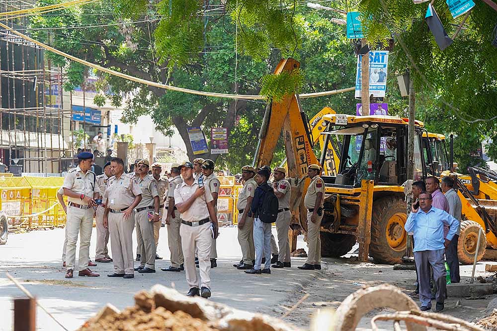 Police personnel during Anti-encroachment drive in Old Rajinder Nagar