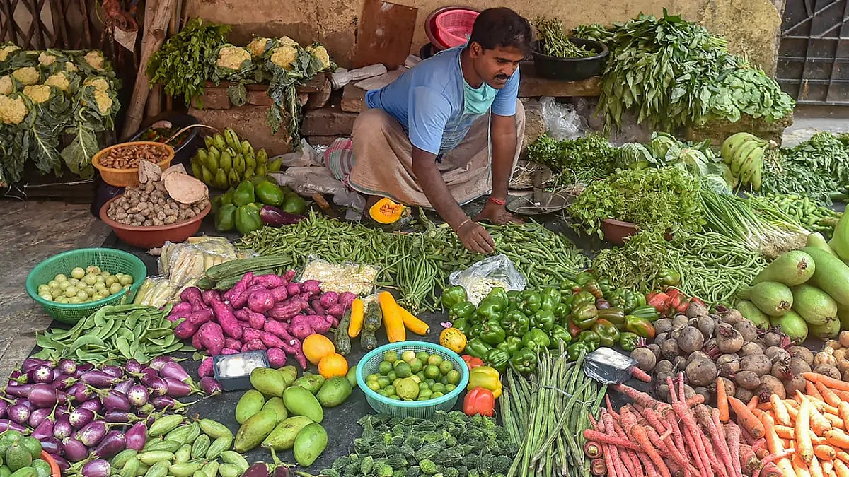 PTI : A vendor selling vegetables |
