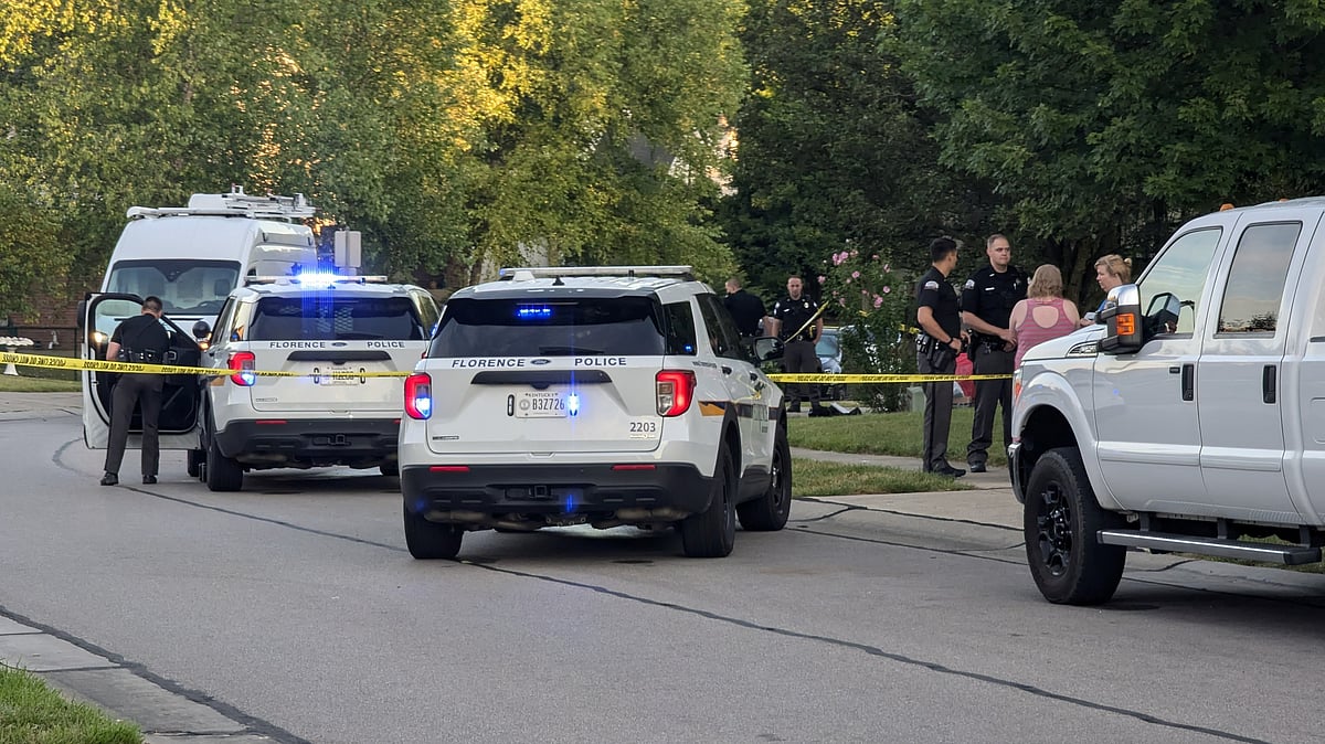 X : Police at the mass shooting site.