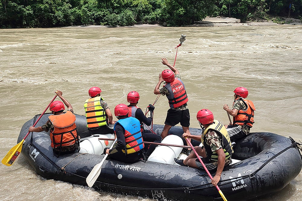 Rescue operation underway after buses swept away due to landslide in Nepal photo gallery_4