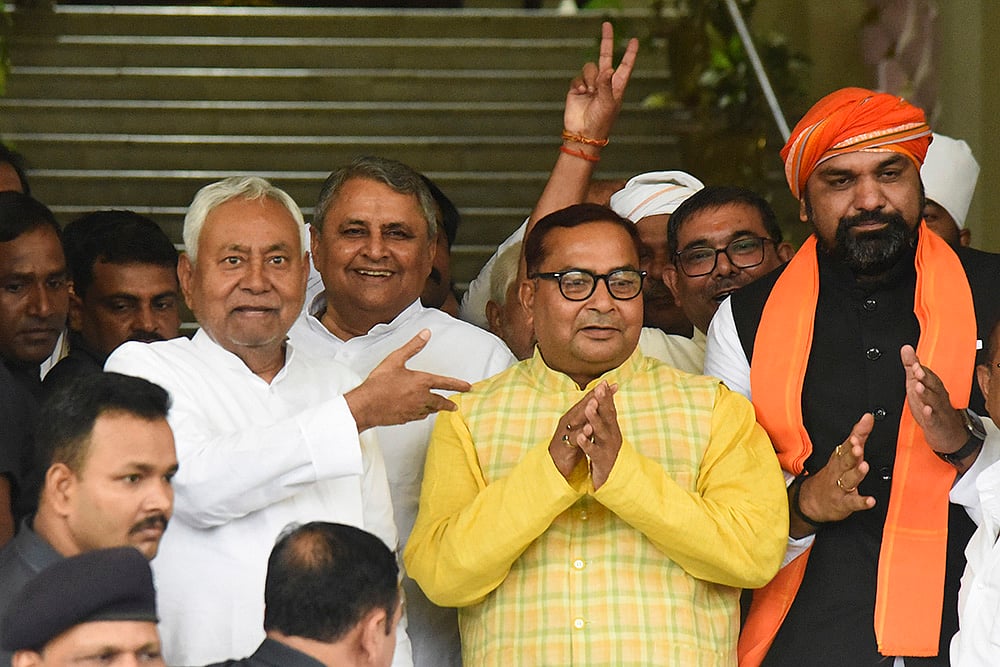 Nitish Kumar and Deputy CM Samrat Choudhary with NDA candidate Bhagwan Singh Kushwaha