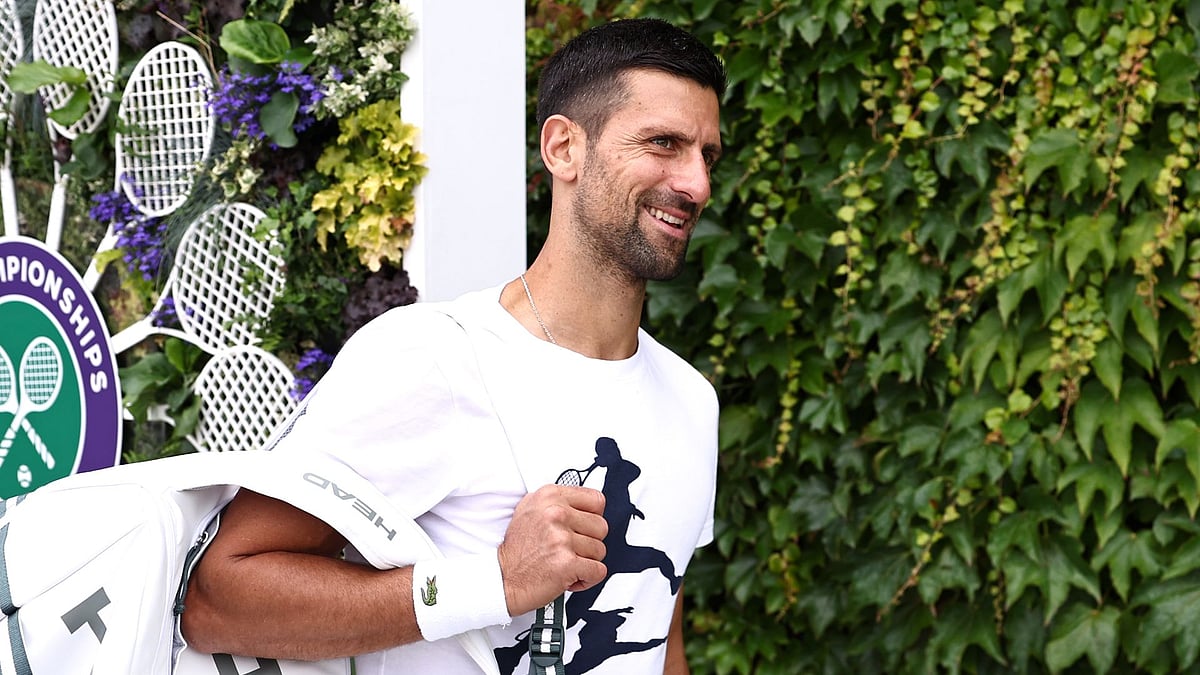 Djokovic in good spirits as he arrives at the practice courts on Saturday - null