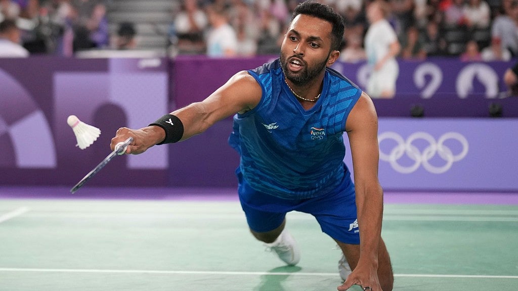 AP/Dita Alangkara : India's H.S. Prannoy plays against Germany's Fabian Roth during their men's singles badminton group stage match at Port de la Chapelle Arena during the 2024 Summer Olympics, Sunday, July 28, 2024, in Paris, France.