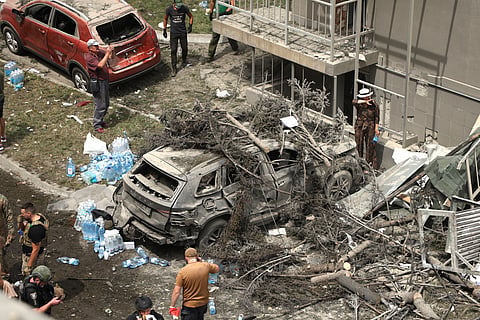 A damaged car outside Okhmadit Children’s Hospital