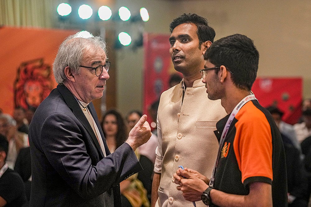 Sharath Kamal and Manav Thakkar with Coach Massimo Costantini during 
 Ultimate Table Tennis 2024 Player Draft