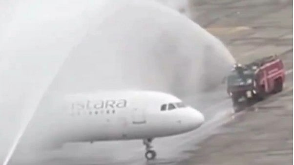 Screengrab of the water cannon salute given to the airplane ferrying the Indian cricket team. 