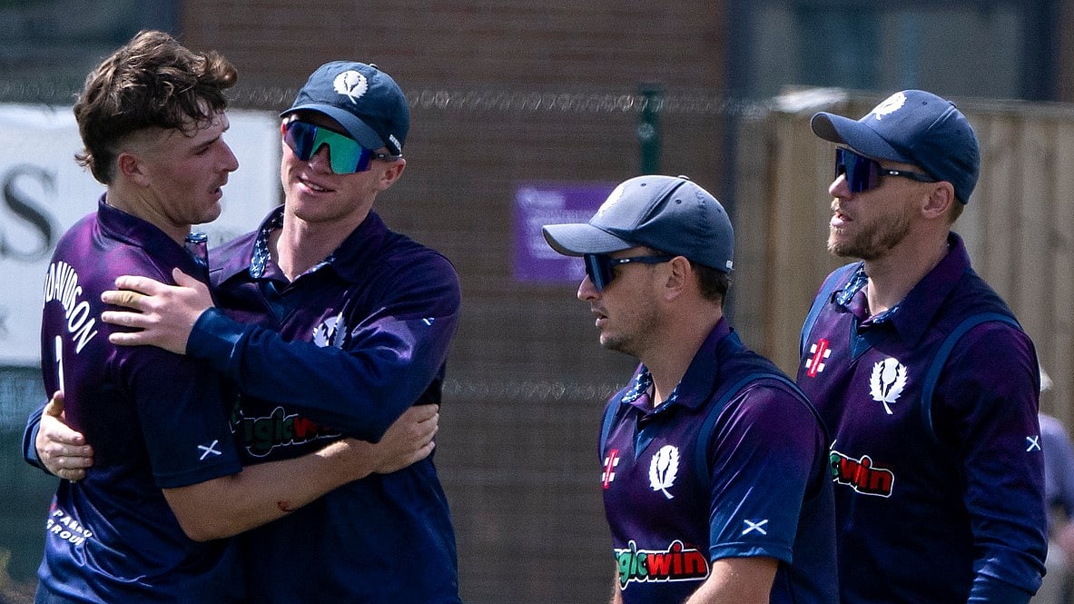 Photo: X/ @CricketScotland : Scotland national cricket team players celebrating a wicket in ICC Men's Cricket World Cup League 2 in Dundee.