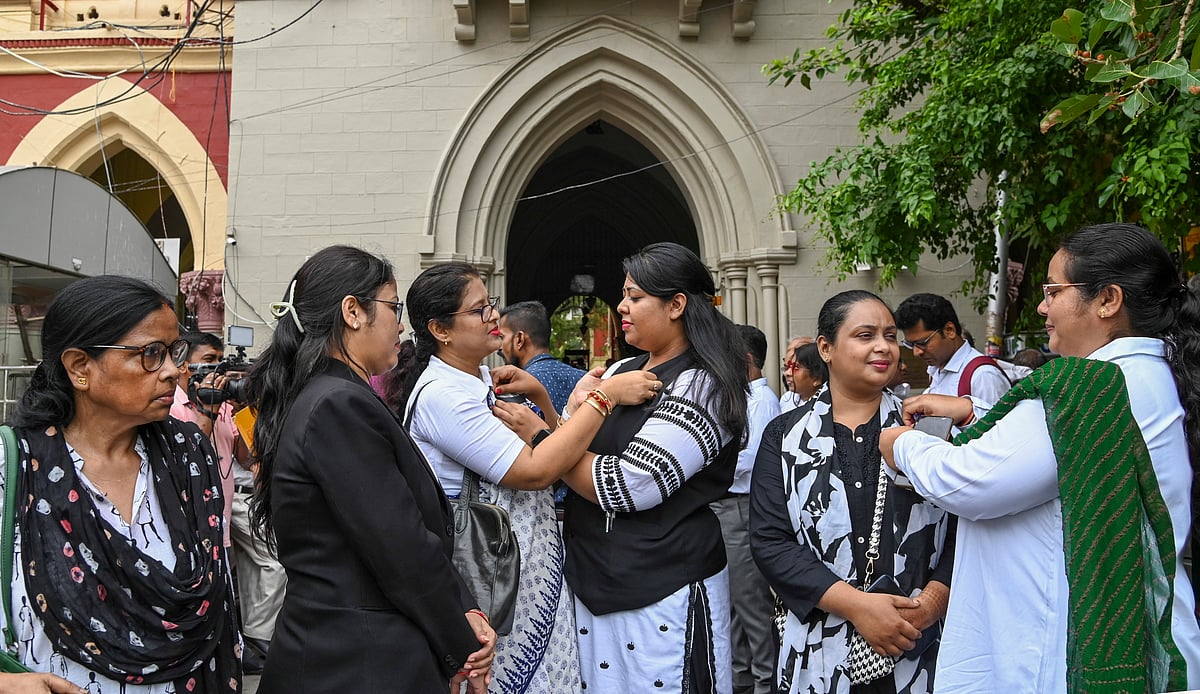 (PTI Photo) : Lawyers wear black ribbon as they observe of black day in protest against implementation of the three new criminal laws, in Kolkata, Monday, July 1, 2024.