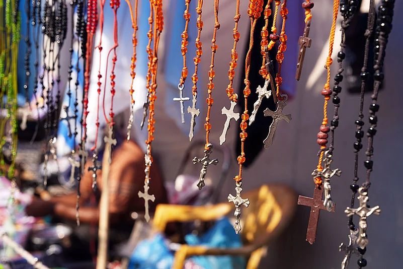 Cross necklaces sold near Ankur Narula Church