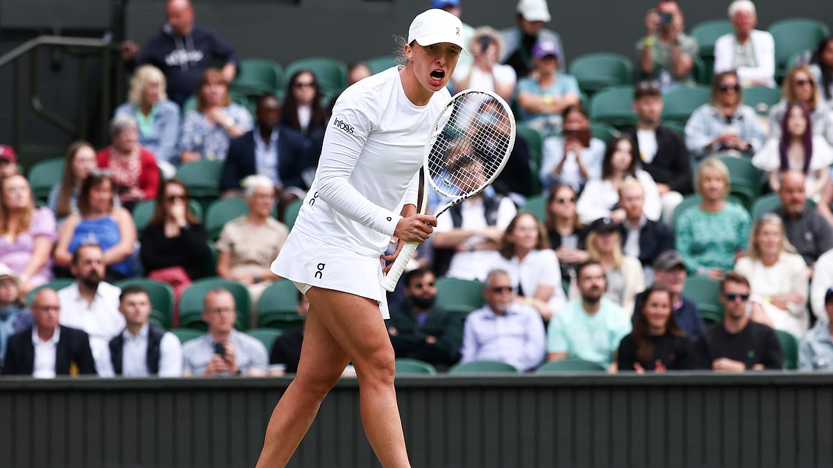 Iga Swiatek celebrates her win over Petra Martic - null