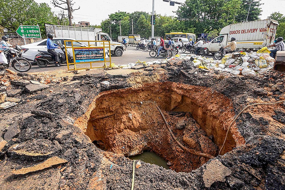 Weather: Road caves-in in Jaipur after rains