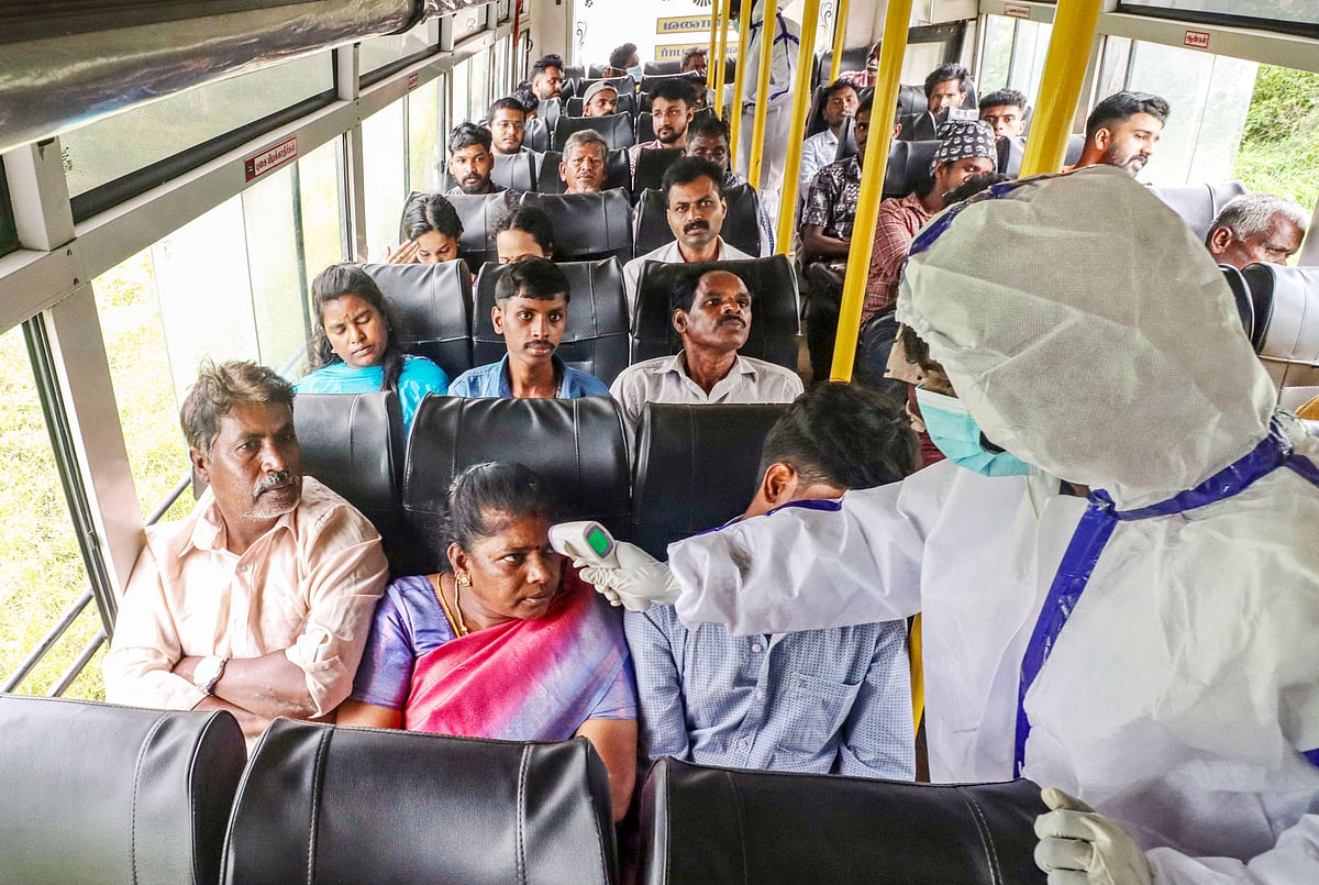 Representational Image/PTI : Tamil Nadu Health workers check the temperature of passengers as a bus from Kerala enters the state amid the spread of Nipah virus, in Coimbatore district, Tuesday, July 23, 2024. A 14-year-old boy died of Nipah virus infection in Malappuram district of Kerala.