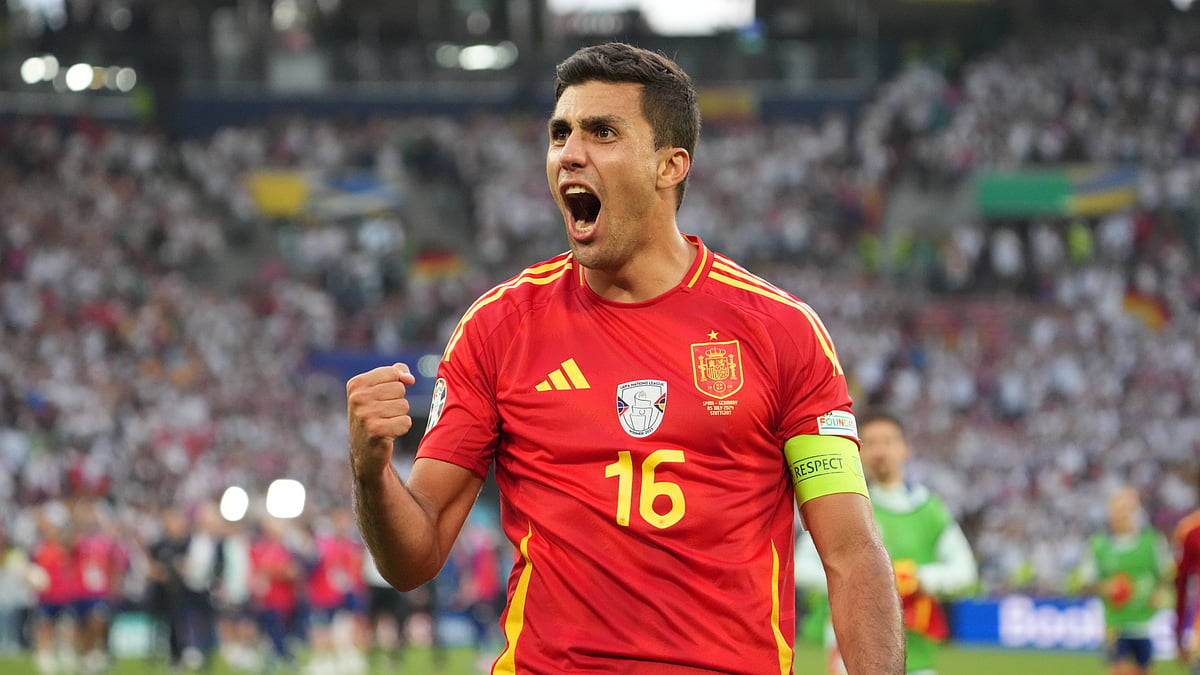 Rodri celebrates Spain's extra-time win over Germany at Euro 2024