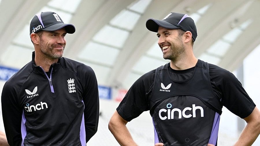 England's new bowling coach James Anderson (left) with Mark Wood ahead of the second Test against West Indies in Trent Bridge.  - X/England Cricket