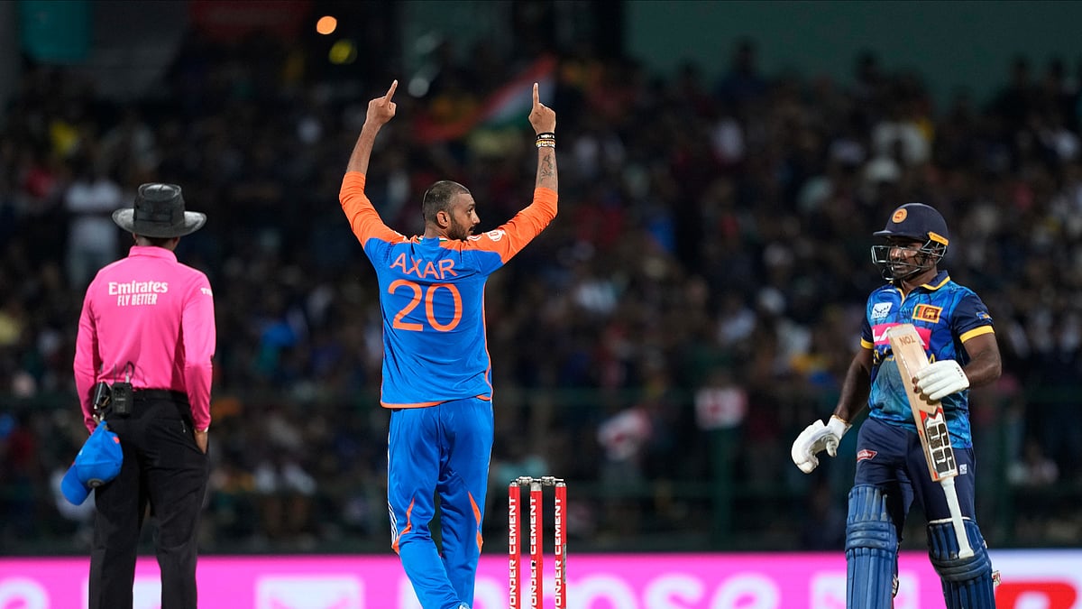 Axar Patel celebrates the wicket of Sri Lankas Kusal Perera. AP Photo