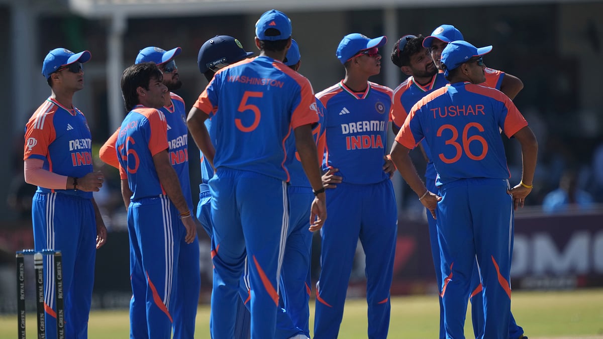 Indian players wait for the umpires decision in Harare. AP Photo