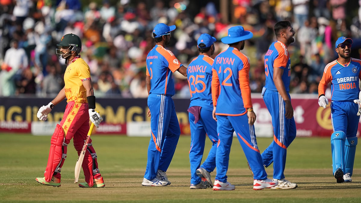 AP Photo/Tsvangirayi Mukwazhi : Zimbabwe batsman Sikandar Raza walks off the pitch after his dismissal during the T20 cricket between Zimbabwe and India at Harare Sports Club.