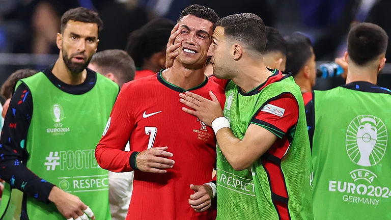 Cristiano Ronaldo was in tears after seeing a penalty saved against Slovenia - null