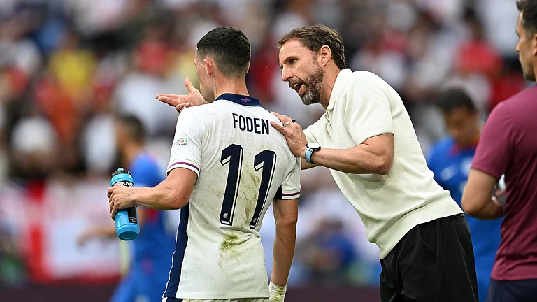 Gareth Southgate and Phil Foden - null