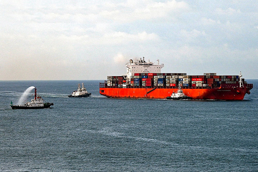 Photo: PTI : Representational image: Ship docks at Kerala's Vizhinjam port